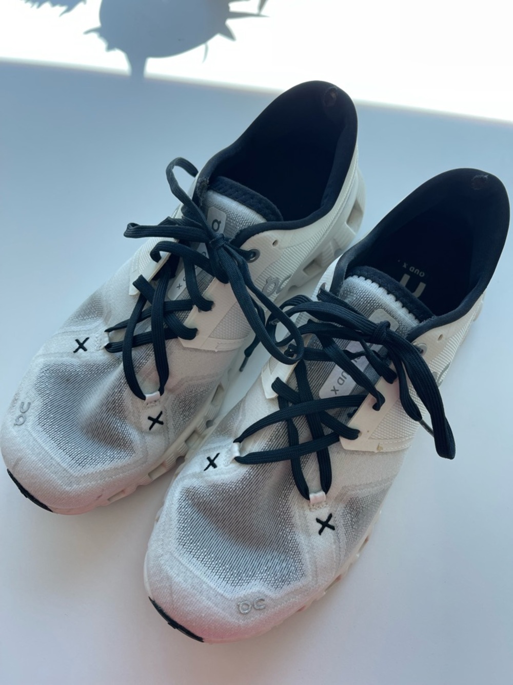 Women’s On Cloud X White and Black Sneakers
